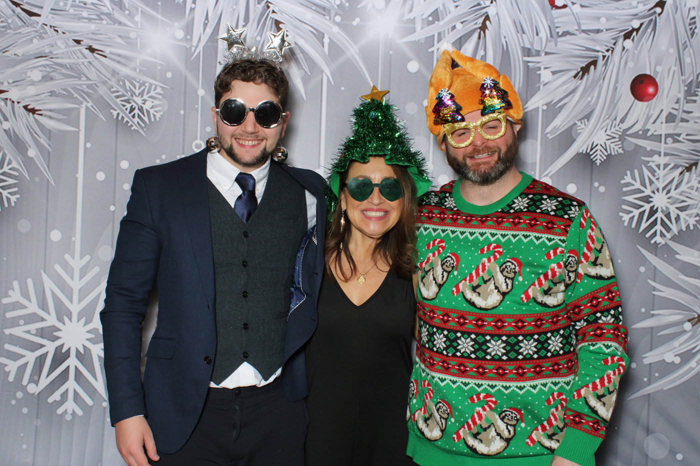 Collabware guests in a Christmas tree hat and an ugly sweater