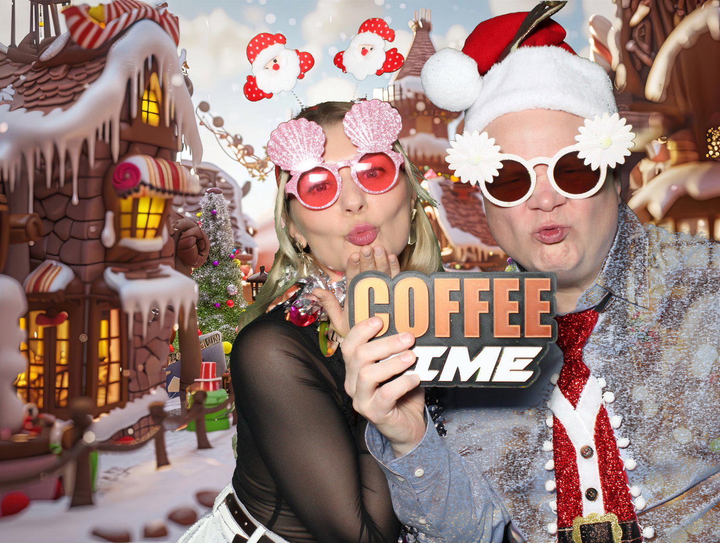 Two Planview guests in festive glasses with a Coffee Time sign